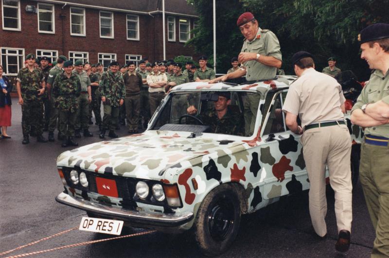 Mike Jackson atop a car leaving Banja Luka when he was GOC of IFOR's MND Southwest