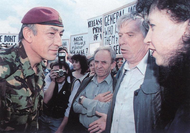 Mike Jackson speaks to protesters in the Balkans