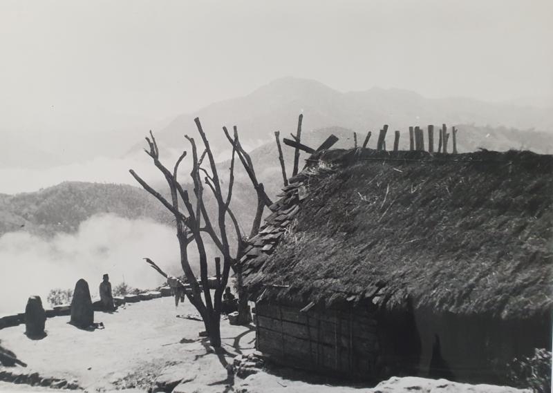 Naga villager hut, probably in the vicinity of Sangshak