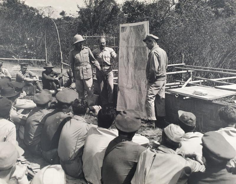 Colonel Cochran (right) and Major General Orde Wingate (left) briefing US Air Commando air crews before Operation Thursday fly-in on 5/6 March 1944