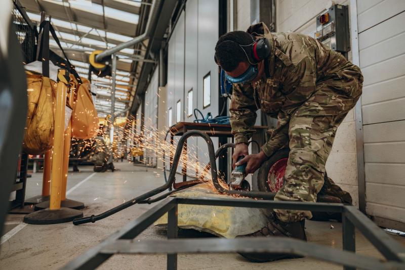 OS Angle grinding a wheelbarrow