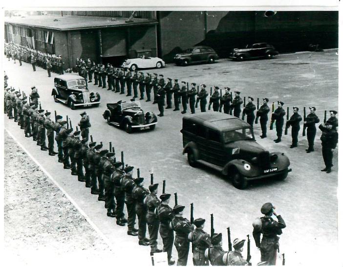Winston Churchill's motorcade passes lines of soldiers on his visit to Ringway, April 1941.